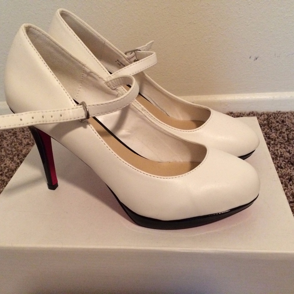 Closed-toed white heels